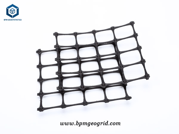 Plastic biaxial geogrid fabric installation